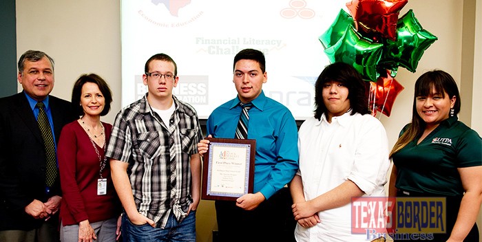  A team from Harlingen High School South won first place in the Stock Market Game, an Internet-based investment simulation and competition sponsored last fall by The University of Texas-Pan American’s Financial Literacy Challenge (FLC). The team was recognized at a recent awards ceremony held at the UTPA College of Business Administration. Pictured left to right are Dr. Alberto Davila, chair, UTPA Department of Economics and Finance; Suzanne Reagan, teacher, Harlingen High School South; winning team members William Nacey, Eric Garcia, and Esteban Rangel; and Edna Pulido, FLC program assistant and economics and finance major at UTPA.
