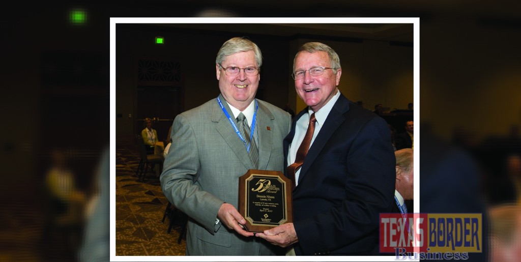 Dennis Nixon, Chairman International Bancshares, left, is presented with his 50 Years in Banking award by Texas Bankers Association President Eric Sandberg. (Photo by Bob Daemmrich.)