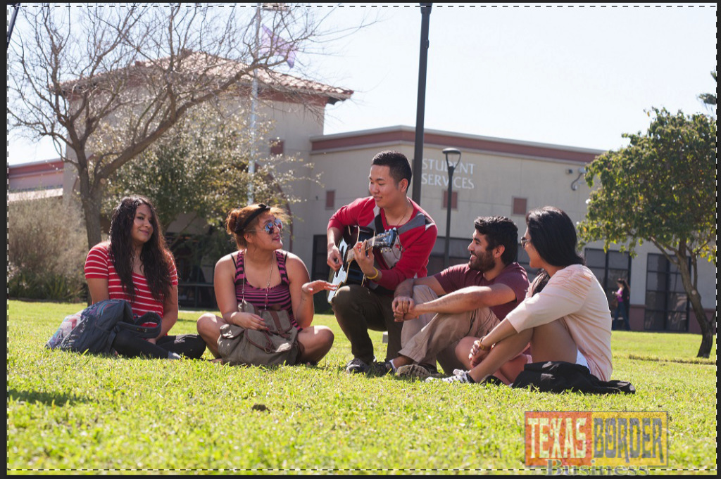 Students at the STC Mid-Valley Campus in Weslaco enjoy listening to a friend play his guitar while waiting for their next class to start. Friendships developed in the classroom help students create a community of support that is an important part of the college experience.